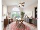 Bright home office with a large arched window, desk, and ample storage at 2061 Grove Field Lane #13, Marietta, GA 30064