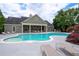 Community pool with lounge chairs, a spa, and a covered pavilion area with seating at 2061 Grove Field Lane #13, Marietta, GA 30064