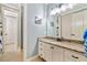 Well-lit bathroom with a granite countertop vanity and a mirror at 3925 Sheldon Ne Dr, Atlanta, GA 30342
