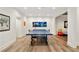Spacious game room featuring a ping pong table and hardwood floors; perfect for Gathering entertainment at 3925 Sheldon Ne Dr, Atlanta, GA 30342