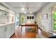 Bright home office with hardwood floors, built-in cabinets, and ample natural light at 3925 Sheldon Ne Dr, Atlanta, GA 30342