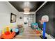 Fun playroom features a blackboard wall and plenty of space for toys and activities at 3925 Sheldon Ne Dr, Atlanta, GA 30342