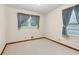 Inviting bedroom with two large windows at 509 Woodland Ln, Lawrenceville, GA 30043