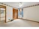 Bedroom featuring a large closet and two windows at 509 Woodland Ln, Lawrenceville, GA 30043