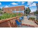 Charming Blue Rooster Bake Shop exterior with inviting outdoor seating and street view at 509 Woodland Ln, Lawrenceville, GA 30043