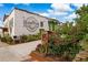 Slow Pour Brewing Company exterior featuring a logo and beautiful landscaping at 509 Woodland Ln, Lawrenceville, GA 30043
