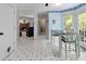 View of dining area, hallway, and living room with fireplace at 569 Hale Mountain Ct, Hiram, GA 30141