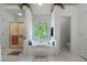 Bathroom featuring a tub under a window, a separate shower, and plenty of natural light at 569 Hale Mountain Ct, Hiram, GA 30141