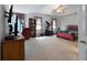 Spacious main bedroom featuring an elliptical trainer and plenty of room for activities at 569 Hale Mountain Ct, Hiram, GA 30141