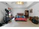 Bright main bedroom with a ceiling fan, a comfortable bed, and a bookcase for storage at 569 Hale Mountain Ct, Hiram, GA 30141
