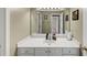 Bathroom featuring white vanity, a large mirror, and excellent lighting at 115 Blue Ridge Trl, Powder Springs, GA 30127