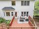 Back deck with outdoor furniture, neutral area rug, and privacy; perfect for relaxing at 115 Blue Ridge Trl, Powder Springs, GA 30127