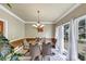 Dining room with tile floors and large windows at 115 Blue Ridge Trl, Powder Springs, GA 30127