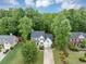 Traditional two-story home featuring white siding, black shutters, and a well-maintained lawn at 115 Blue Ridge Trl, Powder Springs, GA 30127