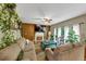 Comfortable living room area with hardwood floors, lots of light, and a fireplace focal point at 115 Blue Ridge Trl, Powder Springs, GA 30127