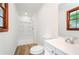 Bathroom with updated shower, vanity, and flooring at 2923 Bicentennial Dr, Stone Mountain, GA 30087