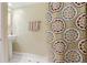 Full bathroom featuring a pedestal sink, decorative shower curtain, and tile floors at 4586 Smoke Rise Ln, Marietta, GA 30062
