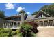 Beautiful exterior elevation with a large deck, gazebo, and a 2-car garage at 4586 Smoke Rise Ln, Marietta, GA 30062