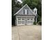 The garage features a two-car capacity with white doors and gray trim at 4586 Smoke Rise Ln, Marietta, GA 30062