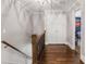Charming hallway with hardwood floors and staircase, showcasing the home's classic design and character at 4586 Smoke Rise Ln, Marietta, GA 30062