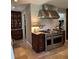 Gourmet kitchen featuring stainless steel appliances and arabesque backsplash at 4586 Smoke Rise Ln, Marietta, GA 30062