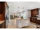 Spacious kitchen with large island, custom cabinets, granite countertops, and stainless steel appliances at 4586 Smoke Rise Ln, Marietta, GA 30062