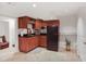 Cozy kitchenette equipped with modern appliances, wooden cabinets, and a sink at 4586 Smoke Rise Ln, Marietta, GA 30062
