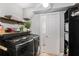 Efficient laundry room with modern washer, dryer, storage shelves, and a bright, functional design at 4586 Smoke Rise Ln, Marietta, GA 30062