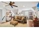 Comfortable living room with a leather sofa and a ceiling fan at 4586 Smoke Rise Ln, Marietta, GA 30062