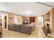 Spacious living room featuring stylish decor, a fireplace and access to dining and kitchen area at 4586 Smoke Rise Ln, Marietta, GA 30062