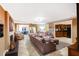 Open-concept living room featuring tile floors, a fireplace and a comfortable sectional sofa at 4586 Smoke Rise Ln, Marietta, GA 30062