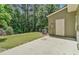 Backyard featuring a patio area and lush green space at 1406 Dolcetto Nw Trce # 13, Kennesaw, GA 30152
