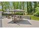 Inviting back deck offering ample seating and dining space, perfect for outdoor gatherings and relaxation at 1767 Hunters Sw Trce, Lilburn, GA 30047