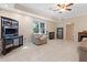 Finished basement with tile flooring, comfortable seating, and a cozy fireplace at 2185 Arbor Chase, Cumming, GA 30041