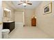 Large bathroom with vanity and shower over tub with curtain at 2185 Arbor Chase, Cumming, GA 30041
