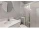 A clean bathroom equipped with a modern vanity, large mirror, and glass shower at 3592 Parkhaven Pl, Brookhaven, GA 30319