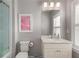 Functional bathroom featuring a tub, a white vanity, and a large mirror at 3592 Parkhaven Pl, Brookhaven, GA 30319