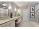 Bright bathroom with dual sinks, marble countertop, and glass-enclosed shower at 3592 Parkhaven Pl, Brookhaven, GA 30319