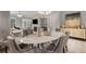 Elegant dining room featuring a marble table, chandelier, and stylish decor at 3592 Parkhaven Pl, Brookhaven, GA 30319