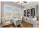 Bright home office with custom built-in bookcase, large windows and hardwood floors at 3592 Parkhaven Pl, Brookhaven, GA 30319
