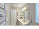 Bathroom featuring a mirror, sink, and soft neutral colors at 3811 Holliwell Pass, Cumming, GA 30040