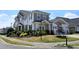Corner lot home with a well-manicured lawn and landscaping, showcasing beautiful curb appeal at 3811 Holliwell Pass, Cumming, GA 30040