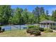 Community pickleball courts with lush trees, perfect for outdoor activities and friendly competition at 3811 Holliwell Pass, Cumming, GA 30040