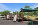 Community playground featuring slides and climbing structures to encourage play and active lifestyles at 3811 Holliwell Pass, Cumming, GA 30040