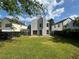 View of a spacious backyard with green lawn and fenced perimeter at 4081 Liberty Hill Dr, Norcross, GA 30093