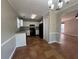 Eat-in kitchen featuring black appliances, neutral walls, updated granite countertops, and tile flooring at 4081 Liberty Hill Dr, Norcross, GA 30093