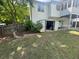 Backyard with a storage shed and a play set, offering plenty of room for outdoor activities and Gathering fun at 955 Tributary Way, Dacula, GA 30019