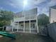 Backyard with a play set, offering plenty of room for outdoor activities and Gathering fun at 955 Tributary Way, Dacula, GA 30019
