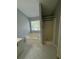 Bathroom featuring a soaking tub and shower, alongside a double sink vanity at 955 Tributary Way, Dacula, GA 30019