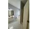 The bathroom includes a soaking tub, separate shower, and double sink vanity with storage at 955 Tributary Way, Dacula, GA 30019